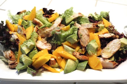 grilled tequila chicken salad with mango, avocado, and cumin dressing