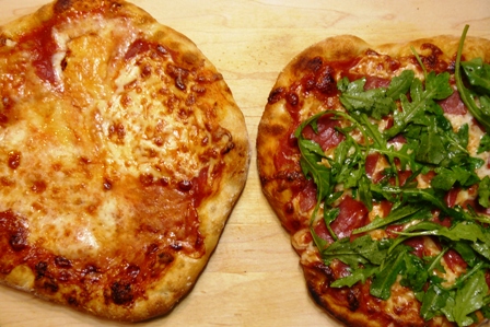 quattro formaggi / prosciutto and arugula pizzas
